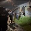 Agentes realizan allanamientos en Limón. (OIJ)