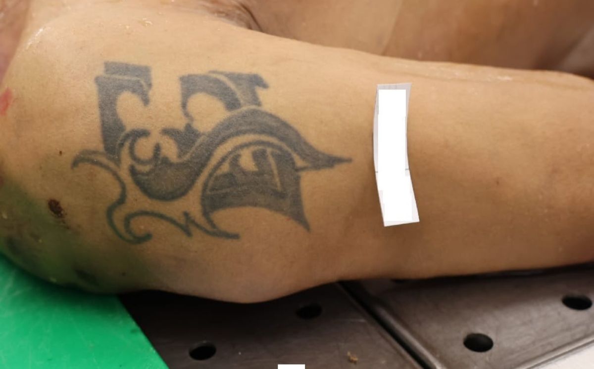 Tatuaje que tenía el hombre fallecido. (OIJ)